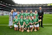 23 July 2023; The Limerick team, back row, left to right, Kate Kelly, St Mary's PS, Bellanaleck, Fermanagh, Hannah Cooney, Rylane NS, Rylane, Cork, Éabha Cinipheic, Gaelscoil Choráin, Eochaill, Corcaigh, Mena Conway, Scoil Mhuire, Carrick on Shannon, Leitrim, Shannon Connolly, Scoil Mhuire, Clontibret, Monaghan, front row, left to right, Olivia Hussey, Lisaniskey NS, Donamon, Roscommon, Shauna Donoghue, Scoil Mhuire gan Smál, Ballymote, Sligo, Faye Daly, Roan St Patrick's PS, Dungannon, Tyrone, Kate Motherway, Bunscoil Bhothar na Naomh, Waterford, Emily Ryan, Burgess NS, Nenagh, Tipperary, with INTO President Dorothy McGinley, Uachtarán an Cumann Camógaíochta Hilda Breslin, and Uachtarán Chumann Lúthchleas Gael Larry McCarthy, ahead of the INTO Cumann na mBunscol GAA Respect Exhibition Go Games at the GAA Hurling All-Ireland Senior Championship final match between Kilkenny and Limerick at Croke Park in Dublin. Photo by Daire Brennan/Sportsfile