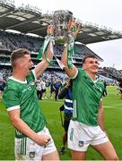 23 July 2023; David Reidy, left, and Cathal O'Neill of Limerick, celebrate with the cup after their side's victory in the GAA Hurling All-Ireland Senior Championship final match between Kilkenny and Limerick at Croke Park in Dublin. Photo by Sam Barnes/Sportsfile