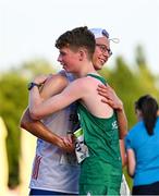 24 July 2023; Seamus Clarke of Ireland, right, embraces Lukas Rosenbaum of Slovakia after competing in the boys 5000m Race Walk Final during day one of the 2023 Summer European Youth Olympic Festival at the Poljane Athletics Stadium in Maribor, Slovenia. Photo by Tyler Miller/Sportsfile