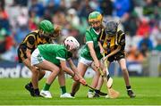 23 July 2023; Holly McErlean, St Brigid's PS, Tirkane, Maghera, Derry, representing Kilkenny, in action against Kate Motherway, Bunscoil Bhothar na Naomh, Waterford, representing Limerick and Éabha Cinipheic, Gaelscoil Choráin, Eochaill, Corcaigh, representing Limerick, during the INTO Cumann na mBunscol GAA Respect Exhibition Go Games at the GAA Hurling All-Ireland Senior Championship final match between Kilkenny and Limerick at Croke Park in Dublin. Photo by Brendan Moran/Sportsfile
