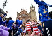24 July 2023; Attendees dance in front of the Guildhall during the opening ceremony of the FRS Recruitment GAA World Games 2023 in Derry. Photo by Ramsey Cardy/Sportsfile