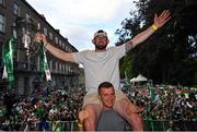24 July 2023; Oisín O'Reilly, top, and Peter Casey during the homecoming celebrations of the Limerick All-Ireland Senior Hurling Champions at Pery Square in Limerick. Photo by David Fitzgerald/Sportsfile
