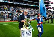 23 July 2023; Captain of the 1998 Offaly All-Ireland winning team Hubert Rigney brings out the Liam MacCarthy cup to the plinth before the GAA Hurling All-Ireland Senior Championship final match between Kilkenny and Limerick at Croke Park in Dublin. Photo by Brendan Moran/Sportsfile