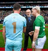 23 July 2023; Limerick captain Cian Lynch introduces teammate Nickie Quaid to Uachtarán Chumann Lúthchleas Gael Larry McCarthy before the GAA Hurling All-Ireland Senior Championship final match between Kilkenny and Limerick at Croke Park in Dublin. Photo by Brendan Moran/Sportsfile
