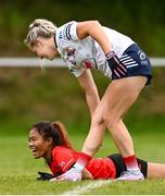 25 July 2023; Kathryn Snell of Heartland and Vith Seangny of Cairde Khmer Cambodia during day two of the FRS Recruitment GAA World Games 2023 at the Owenbeg Centre of Excellence in Dungiven, Derry. Photo by Ramsey Cardy/Sportsfile