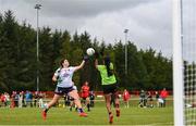 25 July 2023; Cairde Khmer Cambodia goalkeeper Chhuon Dinet and Erin Clapper of Heartland during day two of the FRS Recruitment GAA World Games 2023 at the Owenbeg Centre of Excellence in Dungiven, Derry. Photo by Ramsey Cardy/Sportsfile