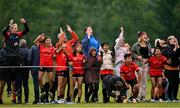 25 July 2023; Cairde Khmer Cambodia ladies footballers react while watching the Cairde Khmer Cambodia mens team during day two of the FRS Recruitment GAA World Games 2023 at the Owenbeg Centre of Excellence in Dungiven, Derry. Photo by Ramsey Cardy/Sportsfile