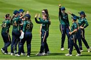 25 July 2023; Cara Murray of Ireland, centre, celebrates with team-mates after bowling Beth Mooney of Australia during match two of the Certa Women’s One Day International Challenge between Ireland and Australia at Castle Avenue in Dublin. Photo by Sam Barnes/Sportsfile