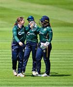 25 July 2023; Cara Murray of Ireland, left, celebrates with team-mates including Mary Waldron, right, after bowling Beth Mooney of Australia during match two of the Certa Women’s One Day International Challenge between Ireland and Australia at Castle Avenue in Dublin. Photo by Sam Barnes/Sportsfile