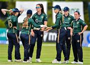25 July 2023; Gaby Lewis of Ireland, third from right celebrates with team-mates after catching out Ellyse Perry of Australia during match two of the Certa Women’s One Day International Challenge between Ireland and Australia at Castle Avenue in Dublin. Photo by Sam Barnes/Sportsfile