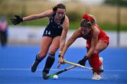 25 July 2023; Ellen Curran of Ireland in action against Doménica Ananías of Chile during the women's hockey international match between Ireland and Chile at the Sport Ireland Campus in Dublin. Photo by Ben McShane/Sportsfile
