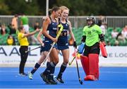 25 July 2023; Elena Tice of Ireland celebrates with Niamh Carey after scoring their side's first goal during the women's hockey international match between Ireland and Chile at the Sport Ireland Campus in Dublin. Photo by Ben McShane/Sportsfile