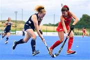 25 July 2023; Michelle Carey of Ireland and Denise Krimerman Losada of Chile during the women's hockey international match between Ireland and Chile at the Sport Ireland Campus in Dublin. Photo by Ben McShane/Sportsfile