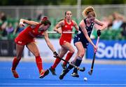 25 July 2023; Niamh Carey of Ireland in action against Fernanda Villagrán Verdaguer of Chile during the women's hockey international match between Ireland and Chile at the Sport Ireland Campus in Dublin. Photo by Ben McShane/Sportsfile
