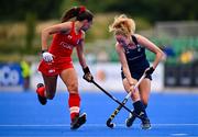 25 July 2023; Michelle Carey of Ireland and María Jesús Maldonado of Chile during the women's hockey international match between Ireland and Chile at the Sport Ireland Campus in Dublin. Photo by Ben McShane/Sportsfile