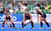 25 July 2023; Ireland players, from left, Sarah McAuley, Deirdre Duke and Caoimhe Perdue prepare for a penalty-corner during the women's hockey international match between Ireland and Chile at the Sport Ireland Campus in Dublin. Photo by Ben McShane/Sportsfile