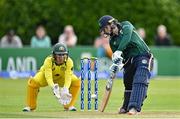 25 July 2023; Cara Murray of Ireland bats as Australia wicketkeeper Alyssa Healy watches on during match two of the Certa Women’s One Day International Challenge between Ireland and Australia at Castle Avenue in Dublin. Photo by Sam Barnes/Sportsfile