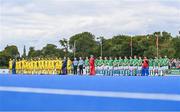 25 July 2023; Players and officials stand for a minute of silence before the Men's EuroHockey Championship Qualifier match between Ireland and Ukraine at the Sport Ireland Campus in Dublin. Photo by Ben McShane/Sportsfile