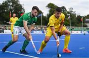 25 July 2023; Dmytro Luppa of Ukraine in action against John McKee of Ireland during the Men's EuroHockey Championship Qualifier match between Ireland and Ukraine at the Sport Ireland Campus in Dublin. Photo by Ben McShane/Sportsfile