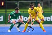 25 July 2023; Vitalii Shevchuk of Ukraine in action against Nicholas Page of Ireland during the Men's EuroHockey Championship Qualifier match between Ireland and Ukraine at the Sport Ireland Campus in Dublin. Photo by Ben McShane/Sportsfile
