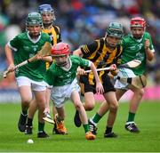 23 July 2023; Caolán McCourt, St. Peter's PS, Newry, Armagh, representing Limerick and Paddy Cronin, Scoil Treasa Naofa, Trá Lí, Ciarrai, representing Limerick, in action against Conor Mahon, Carrig NS, Birr, Offaly, representing Kilkenny during the INTO Cumann na mBunscol GAA Respect Exhibition Go Games at the GAA Hurling All-Ireland Senior Championship final match between Kilkenny and Limerick at Croke Park in Dublin. Photo by Ray McManus/Sportsfile