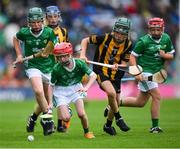 23 July 2023; Caolán McCourt, St. Peter's PS, Newry, Armagh, representing Limerick and Paddy Cronin, Scoil Treasa Naofa, Trá Lí, Ciarrai, representing Limerick, in action against Conor Mahon, Carrig NS, Birr, Offaly, representing Kilkenny during the INTO Cumann na mBunscol GAA Respect Exhibition Go Games at the GAA Hurling All-Ireland Senior Championship final match between Kilkenny and Limerick at Croke Park in Dublin. Photo by Ray McManus/Sportsfile