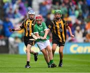 23 July 2023; Tadhg Aherne, Scoil Mháirtin, Kilworth, Cork, representing Limerick, in action against James Walsh, St Laurence's NS, Blackrock, Ath Cliath, representing Kilkenny and Sam Norton, St Canice's Co-Ed NS, Kilkenny, representing Kilkenny during the INTO Cumann na mBunscol GAA Respect Exhibition Go Games at the GAA Hurling All-Ireland Senior Championship final match between Kilkenny and Limerick at Croke Park in Dublin. Photo by Ray McManus/Sportsfile