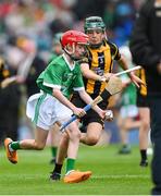 23 July 2023; Caolán McCourt, St. Peter's PS, Newry, Armagh, representing Limerick is tackled by Conor Mahon, Carrig NS, Birr, Offaly, representing Kilkenny during the INTO Cumann na mBunscol GAA Respect Exhibition Go Games at the GAA Hurling All-Ireland Senior Championship final match between Kilkenny and Limerick at Croke Park in Dublin. Photo by Ray McManus/Sportsfile