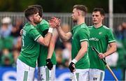 25 July 2023; Shane O'Donoghue of Ireland, left, celebrates with teammates after scoring their side's third goal during the Men's EuroHockey Championship Qualifier match between Ireland and Ukraine at the Sport Ireland Campus in Dublin. Photo by Ben McShane/Sportsfile