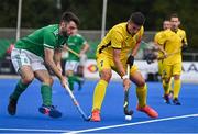 25 July 2023; Dmytro Luppa of Ukraine in action against John McKee of Ireland during the Men's EuroHockey Championship Qualifier match between Ireland and Ukraine at the Sport Ireland Campus in Dublin. Photo by Ben McShane/Sportsfile