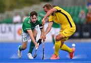 25 July 2023; Sean Murray of Ireland in action against Andrii Koshelenko of Ukraine during the Men's EuroHockey Championship Qualifier match between Ireland and Ukraine at the Sport Ireland Campus in Dublin. Photo by Ben McShane/Sportsfile