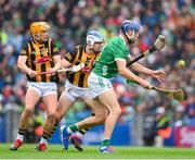 23 July 2023; David Reidy of Limerick is tackled by TJ Reid and Richie Reid of Kilkenny, left, during the GAA Hurling All-Ireland Senior Championship final match between Kilkenny and Limerick at Croke Park in Dublin. Photo by Ray McManus/Sportsfile
