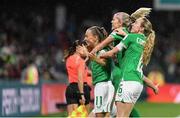 26 July 2023; Katie McCabe of Republic of Ireland, left, celebrates with teammates Denise O'Sullivan and Megan Connolly, after scoring their side's first goal direct from a corner kick during the FIFA Women's World Cup 2023 Group B match between Canada and Republic of Ireland at Perth Rectangular Stadium in Australia. Photo by Mick O'Shea/Sportsfile