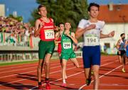 26 July 2023; Sean Cronin of Team Ireland, centre, reacts after crossing the finsh line to place fourth in the boys 1500m final during day three of the 2023 Summer European Youth Olympic Festival at Poljane Athletics Stadium in Maribor, Slovenia. Photo by Tyler Miller/Sportsfile