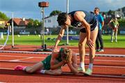 26 July 2023; Sean Cronin of Team Ireland, left, is consoled by Joonatan Venalainen of Team Israel after finshing fourth in the boys 1500m final during day three of the 2023 Summer European Youth Olympic Festival at Poljane Athletics Stadium in Maribor, Slovenia. Photo by Tyler Miller/Sportsfile