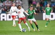 26 July 2023; Ashley Lawrence of Canada in action against Abbie Larkin of Republic of Ireland during the FIFA Women's World Cup 2023 Group B match between Canada and Republic of Ireland at Perth Rectangular Stadium in Perth, Australia. Photo by Stephen McCarthy/Sportsfile