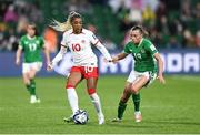 26 July 2023; Ashley Lawrence of Canada in action against Abbie Larkin of Republic of Ireland during the FIFA Women's World Cup 2023 Group B match between Canada and Republic of Ireland at Perth Rectangular Stadium in Perth, Australia. Photo by Stephen McCarthy/Sportsfile