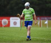 27 July 2023; South East 1 goalkeeper John Michael English looks at his broken hurl during the match against Coastal Virginia during day four of the FRS Recruitment GAA World Games 2023 at the Owenbeg Centre of Excellence in Dungiven, Derry. Photo by Piaras Ó Mídheach/Sportsfile