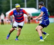 27 July 2023; Seamus McVey of Coastal Virginia in action against David G O'Connor of South East 1 during day four of the FRS Recruitment GAA World Games 2023 at the Owenbeg Centre of Excellence in Dungiven, Derry. Photo by Piaras Ó Mídheach/Sportsfile