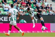 27 July 2023; Sean Hoare of Shamrock Rovers in action against Cristian Ramirez of Ferencvaros during the UEFA Europa Conference League Second Qualifying Round First Leg match between Ferencvaros and Shamrock Rovers at Ferencváros Stadion in Budapest, Hungary. Photo by David Balogh/Sportsfile