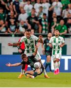 27 July 2023; Johnny Kenny of Shamrock Rovers in action against Samy Mmaee of Ferencvaros during the UEFA Europa Conference League Second Qualifying Round First Leg match between Ferencvaros and Shamrock Rovers at Ferencváros Stadion in Budapest, Hungary. Photo by David Balogh/Sportsfile