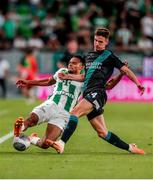 27 July 2023; Samy Mmaee of Ferencvaros is tackled by Johnny Kenny of Shamrock Rovers during the UEFA Europa Conference League Second Qualifying Round First Leg match between Ferencvaros and Shamrock Rovers at Ferencváros Stadion in Budapest, Hungary. Photo by David Balogh/Sportsfile