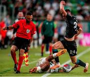 27 July 2023; Samy Mmaee of Ferencvaros is tackled by Johnny Kenny of Shamrock Rovers during the UEFA Europa Conference League Second Qualifying Round First Leg match between Ferencvaros and Shamrock Rovers at Ferencváros Stadion in Budapest, Hungary. Photo by David Balogh/Sportsfile
