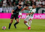 27 July 2023; Roberto Lopes of Shamrock Rovers in action against Mohammad Abu Fani of Ferencvaros during the UEFA Europa Conference League Second Qualifying Round First Leg match between Ferencvaros and Shamrock Rovers at Ferencváros Stadion in Budapest, Hungary. Photo by David Balogh/Sportsfile