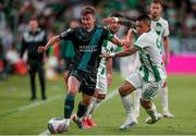 27 July 2023; Ronan Finn of Shamrock Rovers in action against Cristian Ramirez of Ferencvaros during the UEFA Europa Conference League Second Qualifying Round First Leg match between Ferencvaros and Shamrock Rovers at Ferencváros Stadion in Budapest, Hungary. Photo by David Balogh/Sportsfile