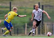 27 July 2023; Greg Sloggett of Dundalk in action against Birgir Baldvinsson of KA during the UEFA Europa Conference League Second Qualifying Round First Leg match between KA and Dundalk at the Framvöllur in Reykjavik, Iceland. Photo by Haflidi Breidfjord/Sportsfile