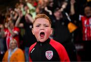 27 July 2023; Derry City supporter Braelin Diver, age 4, celebrates after the UEFA Europa Conference League Second Qualifying Round First Leg match between Derry City and KuPS at the Ryan McBride Brandywell Stadium in Derry. Photo by David Fitzgerald/Sportsfile