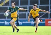 28 July 2023; Cory Quinn of Australasia in action against Niall Rooney of Middle East during the Men's Football Open Cup Final Oakleaf Cup during day five of the FRS Recruitment GAA World Games 2023 at Celtic Park in Derry. Photo by Piaras Ó Mídheach/Sportsfile