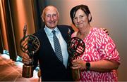 28 July 2023; Lifetime Achievement Award recipients Mickey Whelan of Dublin and Marie Crotty of Waterford during the GPA Football Legends lunch at Croke Park in Dublin. Photo by Ramsey Cardy/Sportsfile