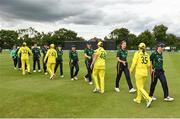 28 July 2023; Ireland and Australia players shake hands after match three of the Certa Women’s One Day International Challenge series between Ireland and Australia at Castle Avenue Cricket Ground in Dublin. Photo by Seb Daly/Sportsfile